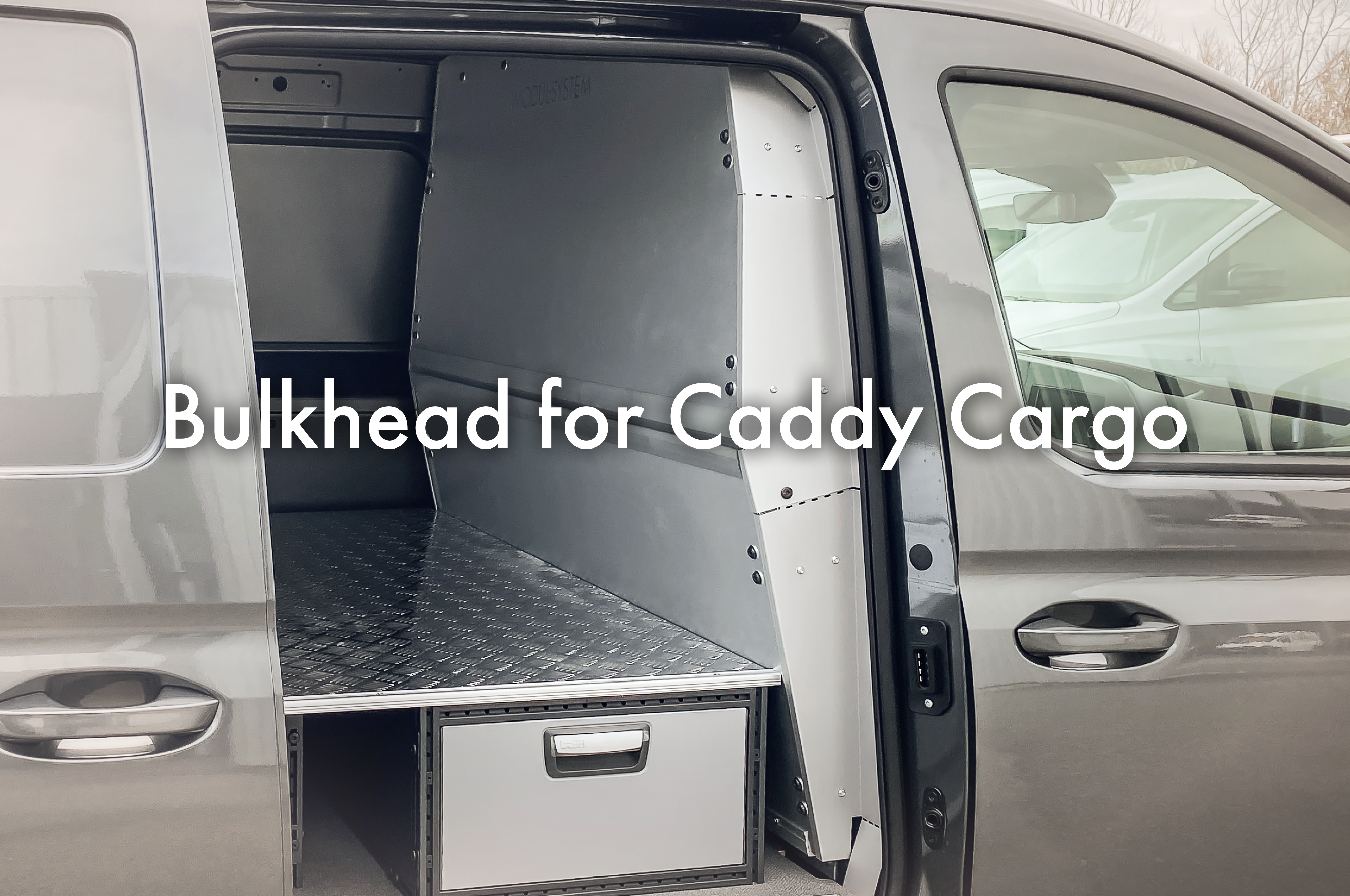 Törmäysturvallinen väliseinä Caddy Cargolle